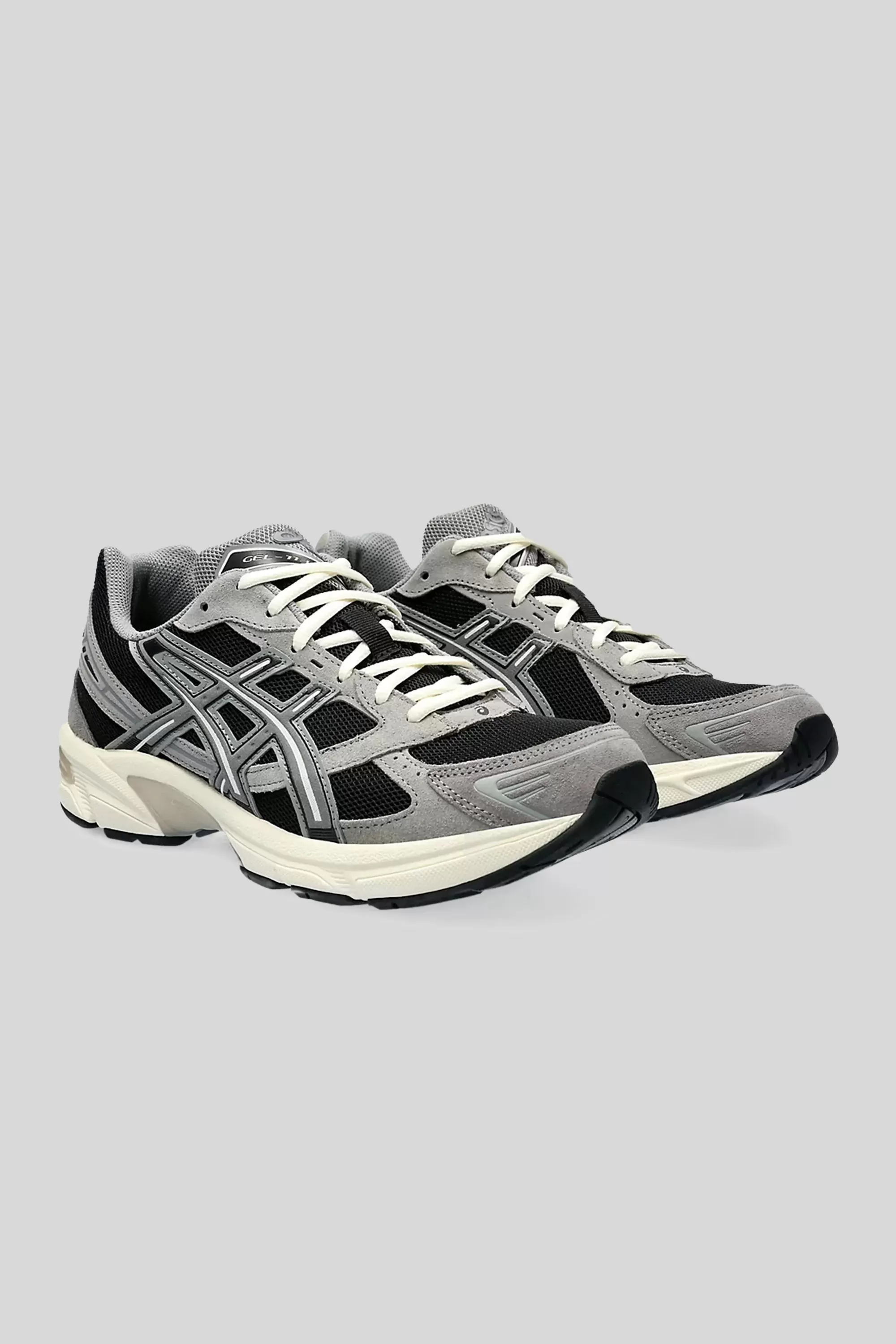 ASICS Men's Gel-1130 Sneaker in Black/Carbon