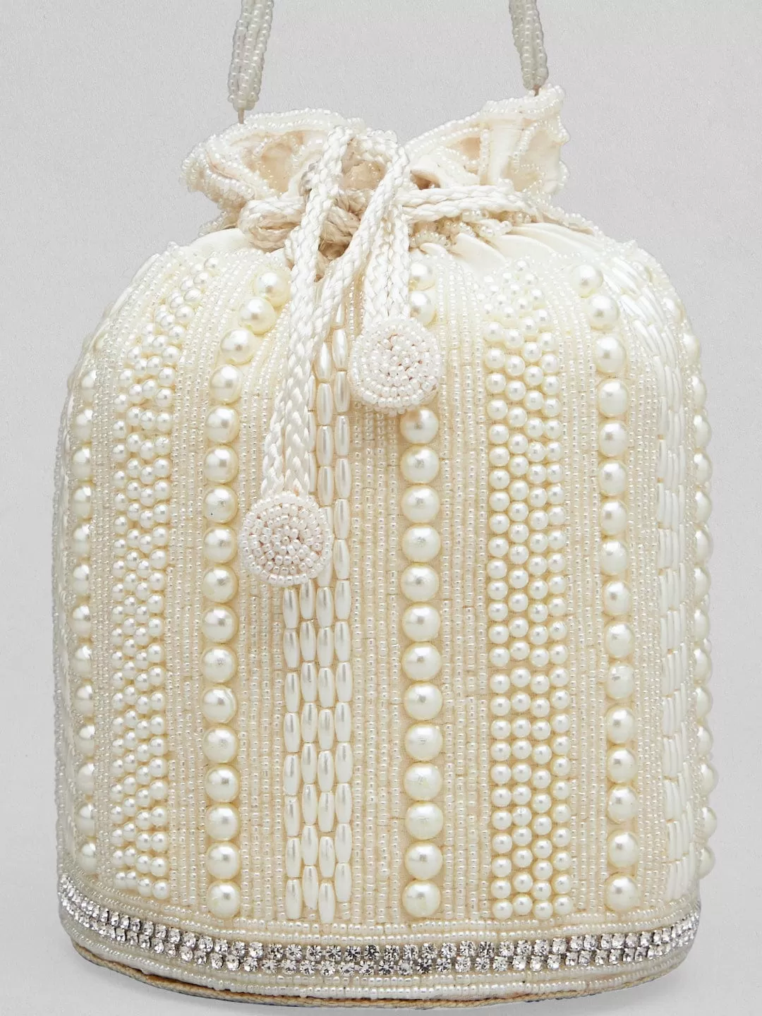 Rubans Off White Colour Potli Bag With Studded With Pearls Design.