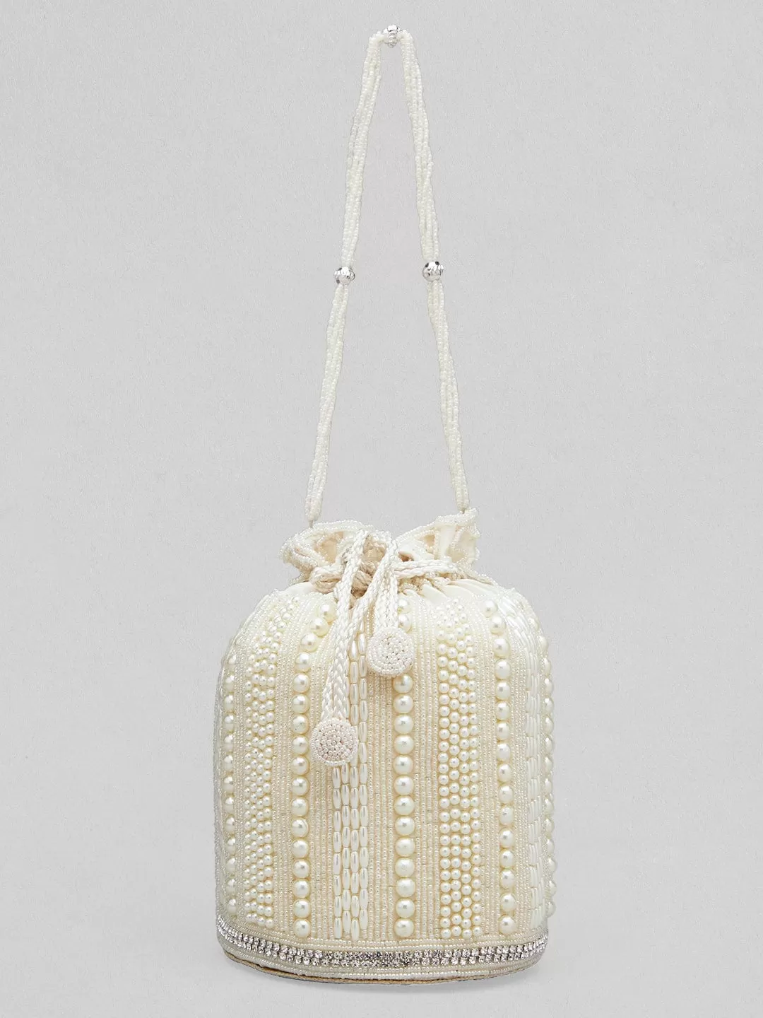 Rubans Off White Colour Potli Bag With Studded With Pearls Design.