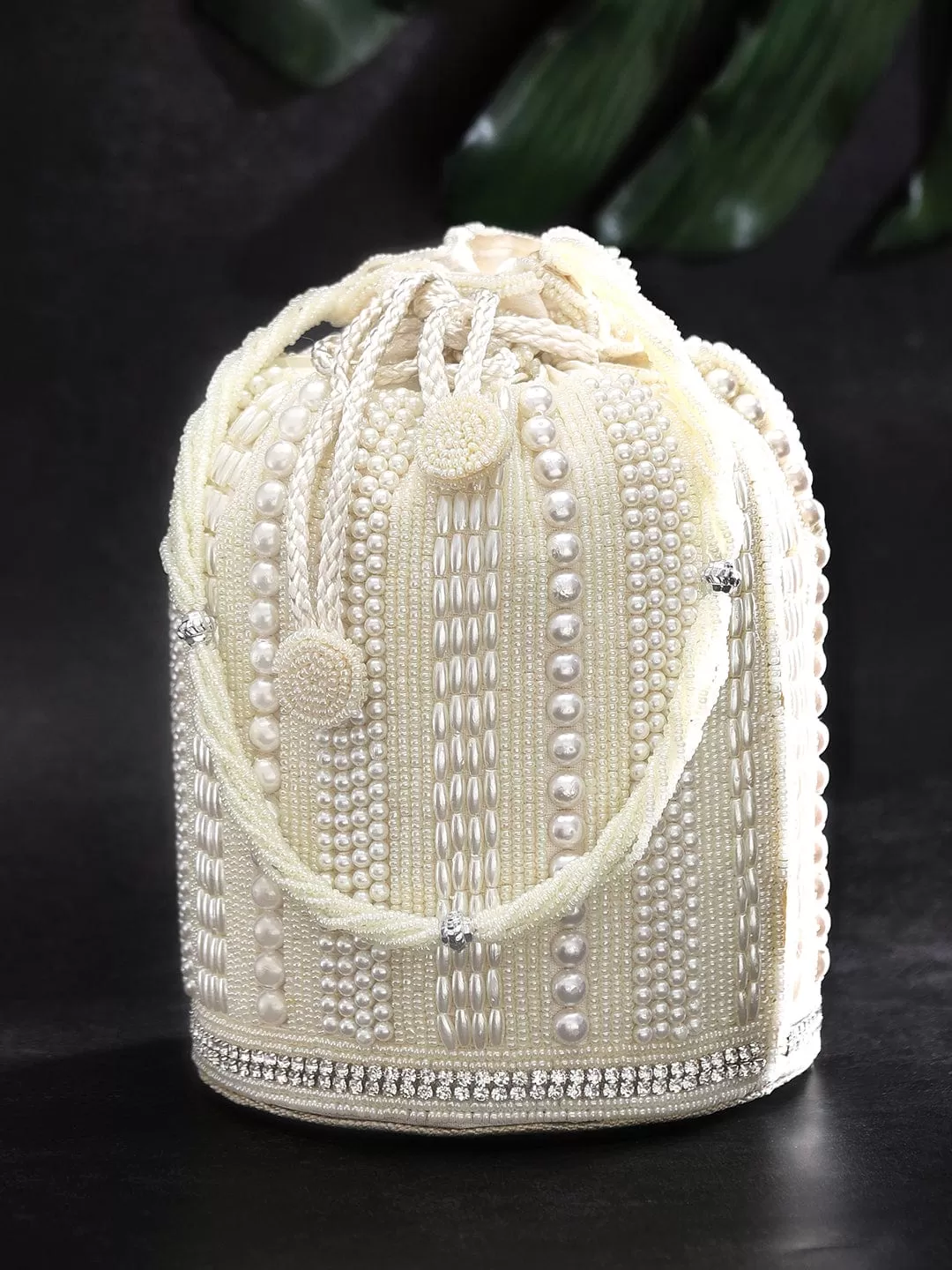 Rubans Off White Colour Potli Bag With Studded With Pearls Design.